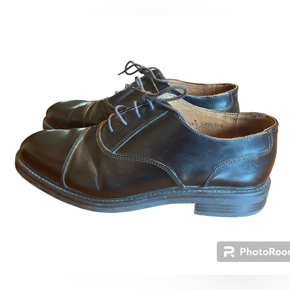 Men’s Georgio Brutini size 13 black dress shoes.